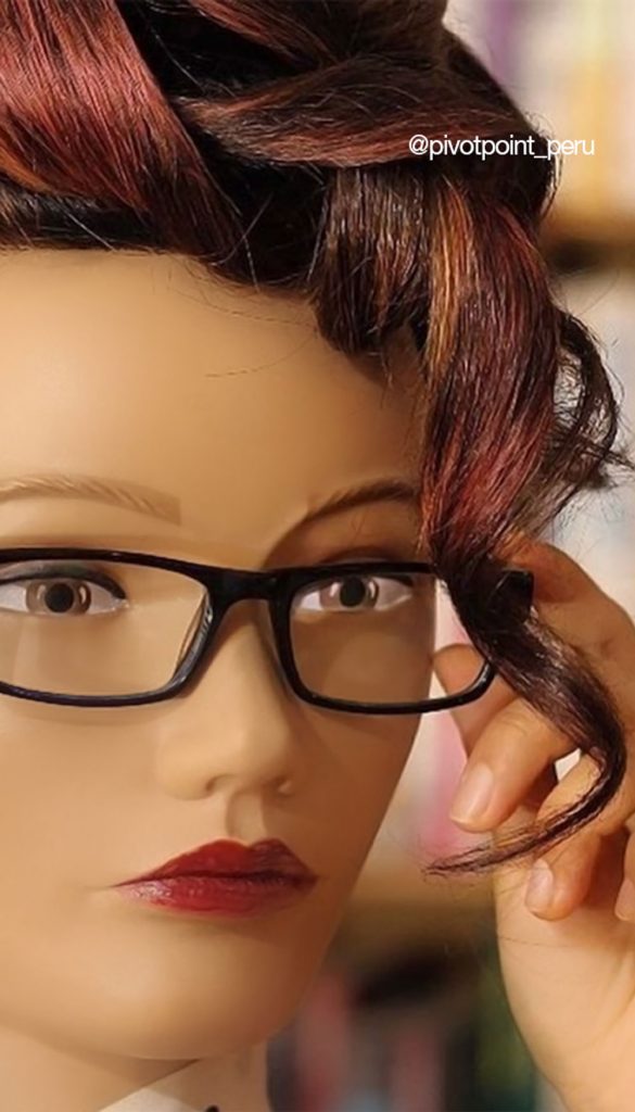 Styled Pivot Point mannequin with spec and hair band. Dark hair. @pivotpoint_peru