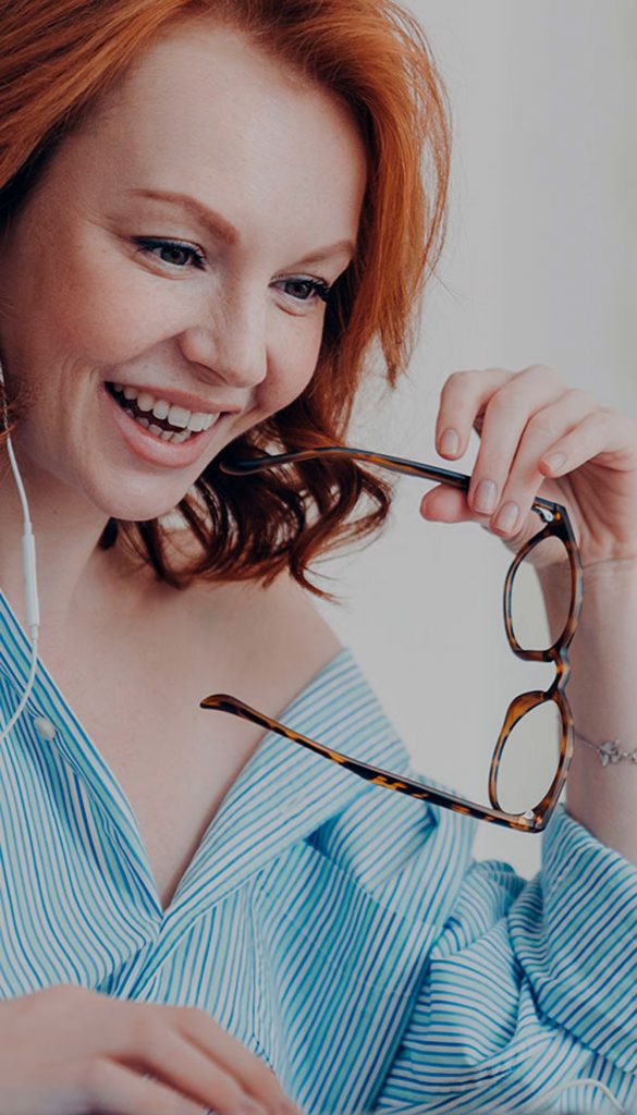 Happy woman working on laptop